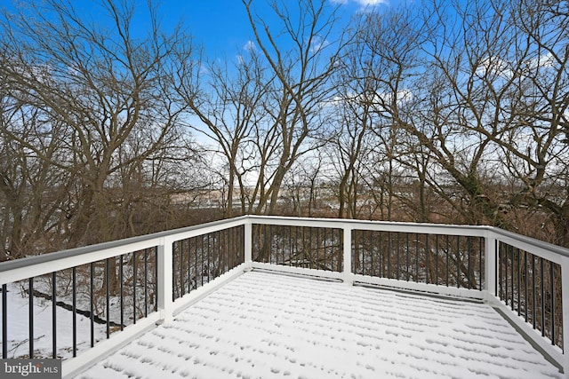 view of snow covered deck