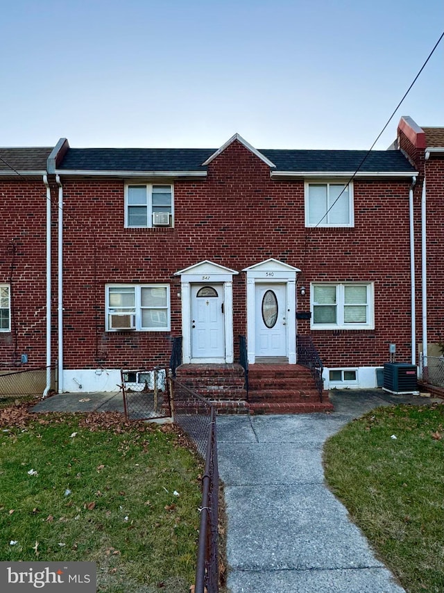 view of front of house featuring central air condition unit