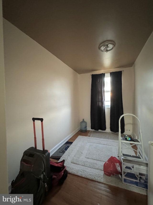 miscellaneous room with hardwood / wood-style flooring