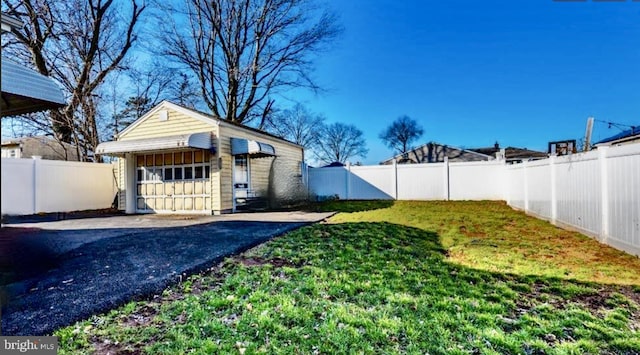 view of yard featuring a garage