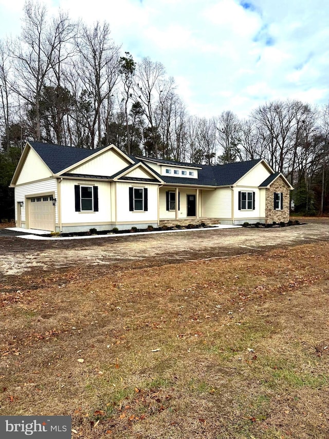 ranch-style home with a garage