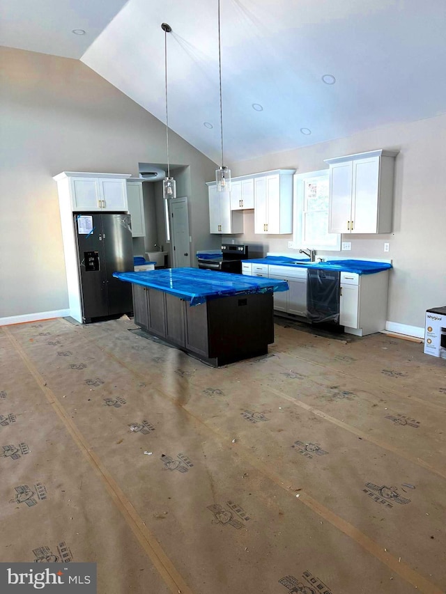 kitchen featuring white cabinets, black appliances, a kitchen island, hanging light fixtures, and high vaulted ceiling