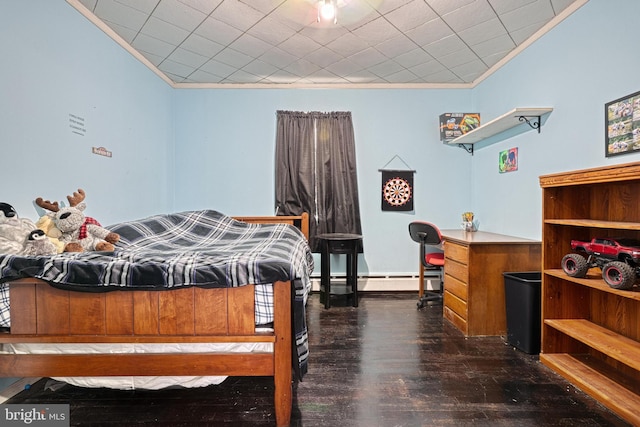 bedroom featuring ornamental molding, a baseboard radiator, and dark wood-type flooring