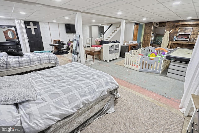 bedroom with concrete flooring