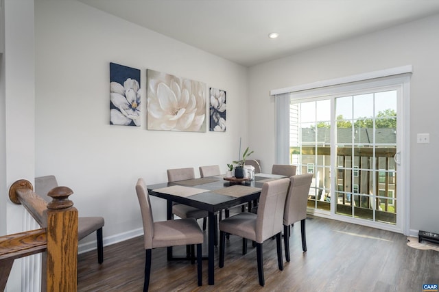 dining room with dark wood-type flooring