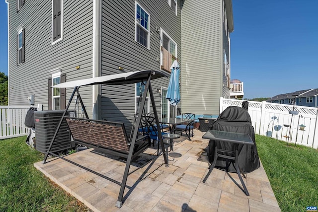 view of patio with central air condition unit