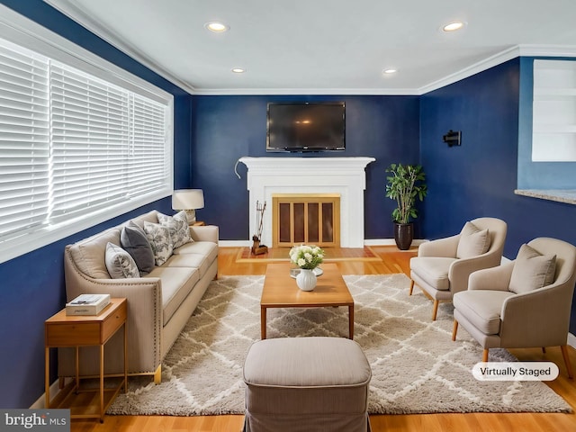 living room featuring crown molding and wood-type flooring