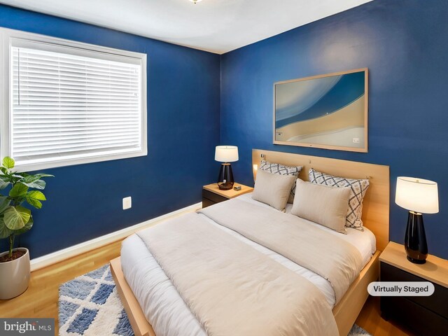 bedroom featuring hardwood / wood-style floors