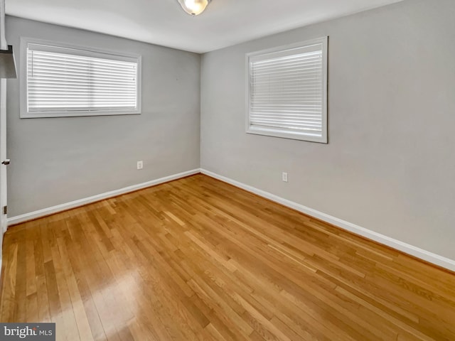 empty room with light wood-type flooring