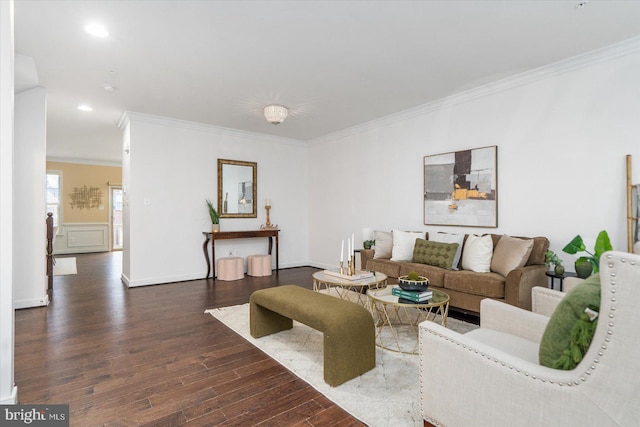 living room with dark hardwood / wood-style floors and ornamental molding