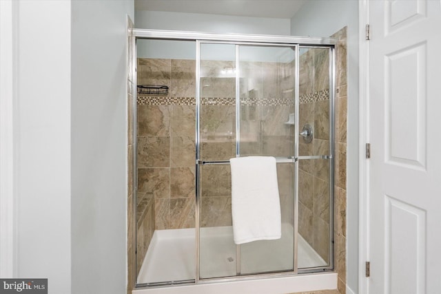 bathroom featuring walk in shower