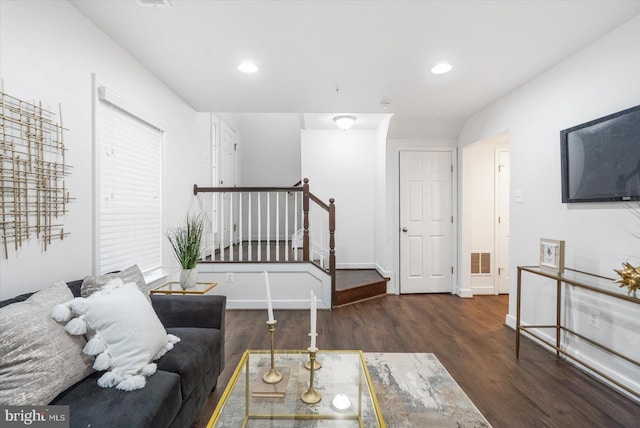 living room with dark wood-type flooring