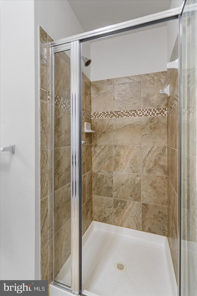 bathroom featuring walk in shower