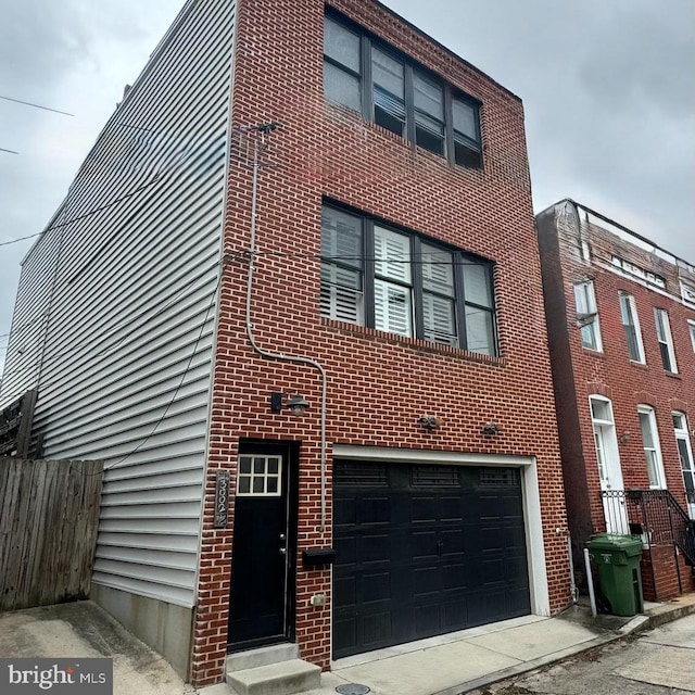 view of building exterior featuring a garage