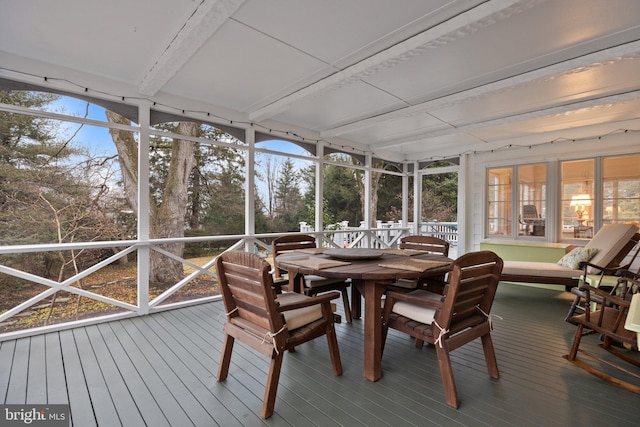 sunroom / solarium with beam ceiling