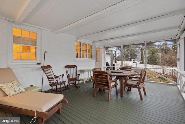 sunroom / solarium with beam ceiling