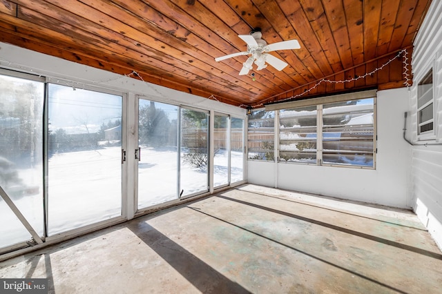 unfurnished sunroom featuring wooden ceiling, lofted ceiling, and ceiling fan