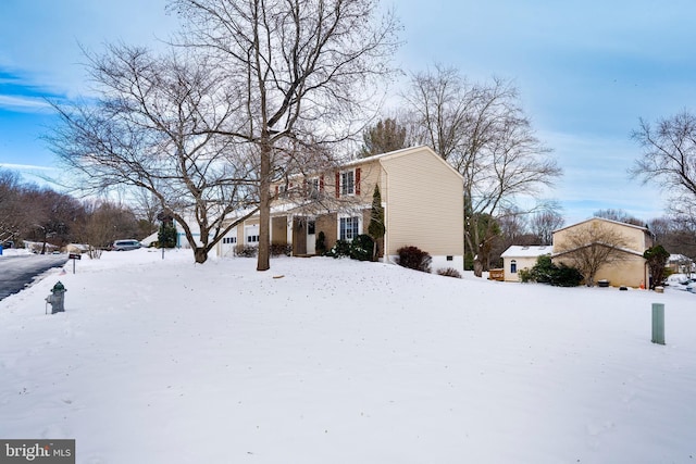 view of snow covered property