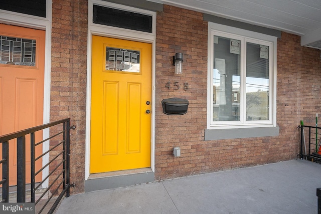 doorway to property with a porch