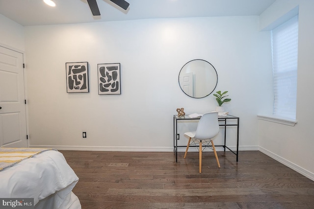 bedroom featuring dark hardwood / wood-style flooring and ceiling fan