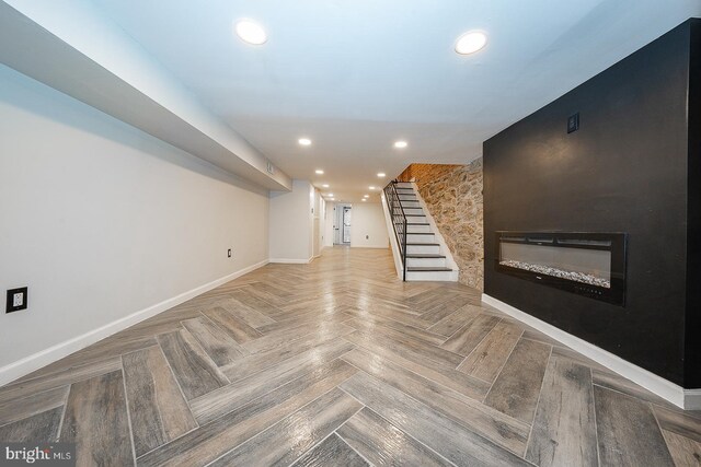 basement featuring parquet floors