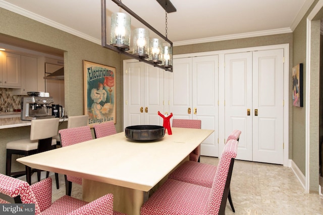 dining area with a notable chandelier, light tile patterned flooring, and crown molding