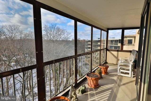 sunroom featuring a healthy amount of sunlight