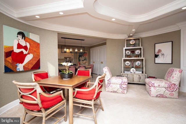 dining space with carpet floors, crown molding, a notable chandelier, and coffered ceiling