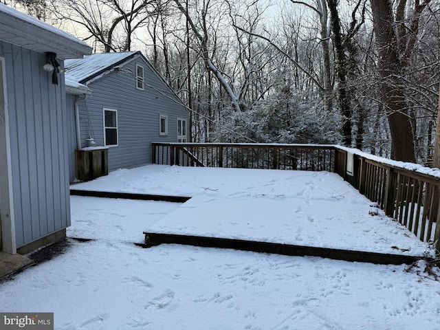 view of snow covered deck