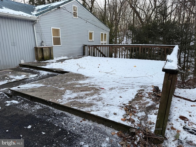 view of snow covered deck