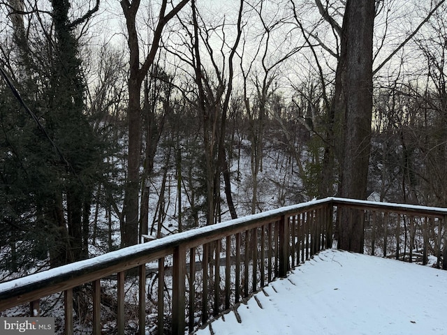 view of snow covered deck