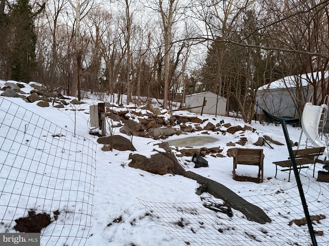 view of snowy yard