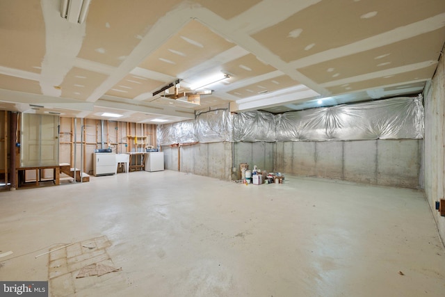 basement with separate washer and dryer