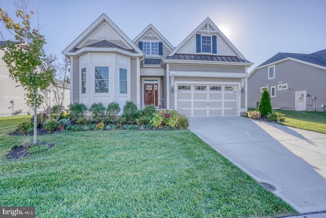 view of front facade with a front lawn and a garage