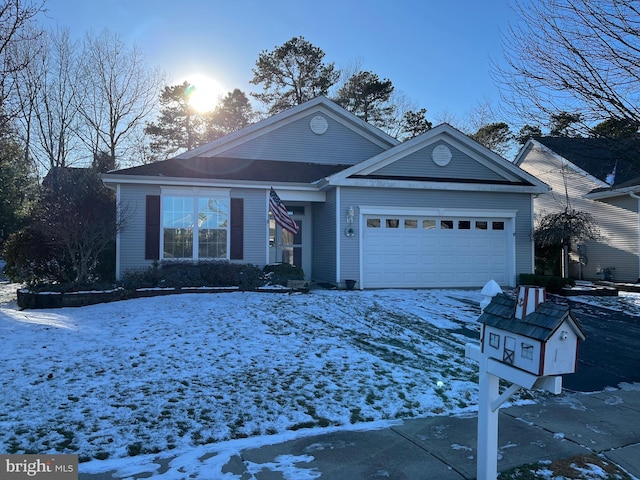 view of front of home with a garage