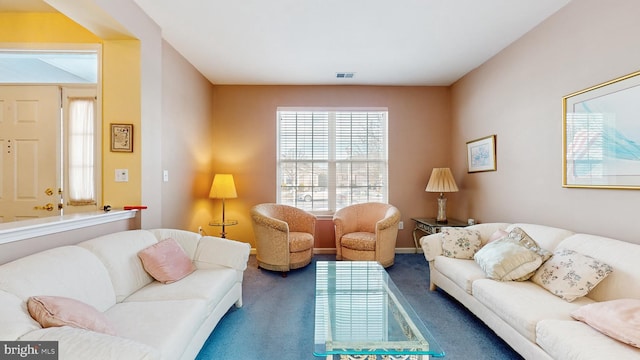 living room featuring carpet