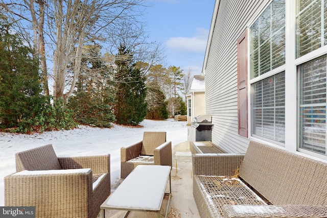 view of snow covered patio