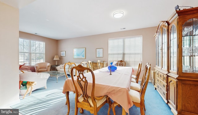 view of carpeted dining space