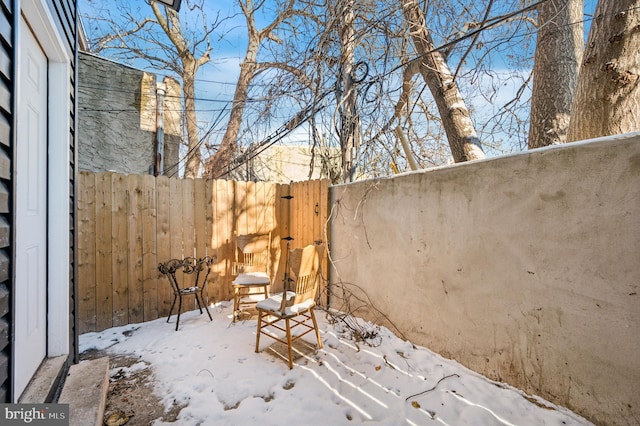 view of snow covered patio