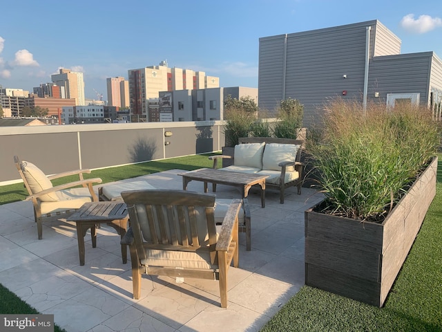 view of patio featuring a city view and an outdoor living space