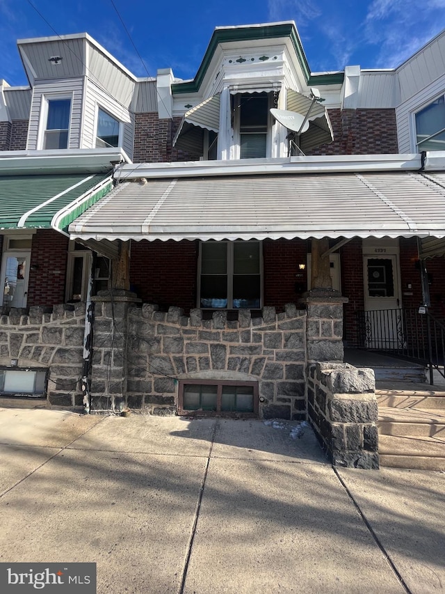 view of front facade featuring covered porch