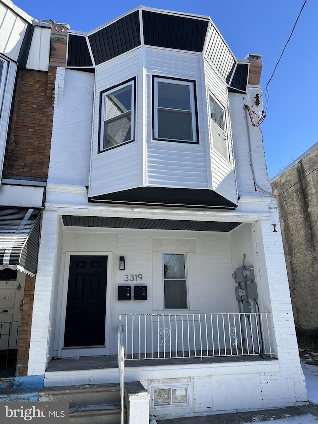 view of front facade featuring covered porch