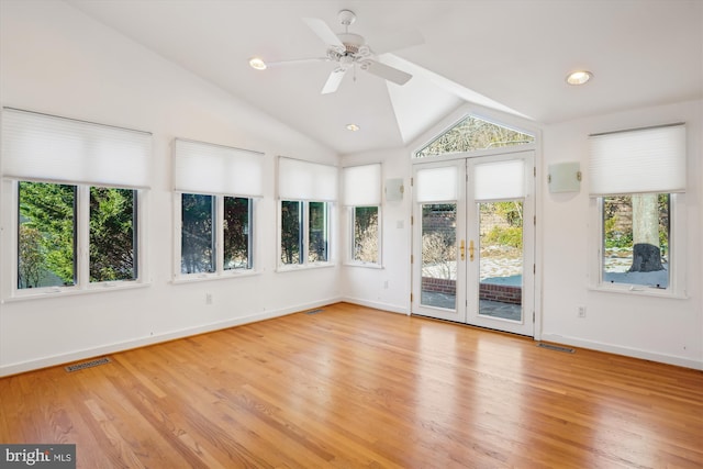 unfurnished sunroom with lofted ceiling, french doors, and ceiling fan