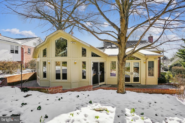 view of snow covered property