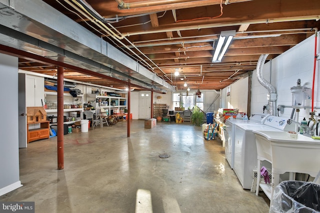 basement with separate washer and dryer