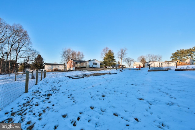 view of yard covered in snow