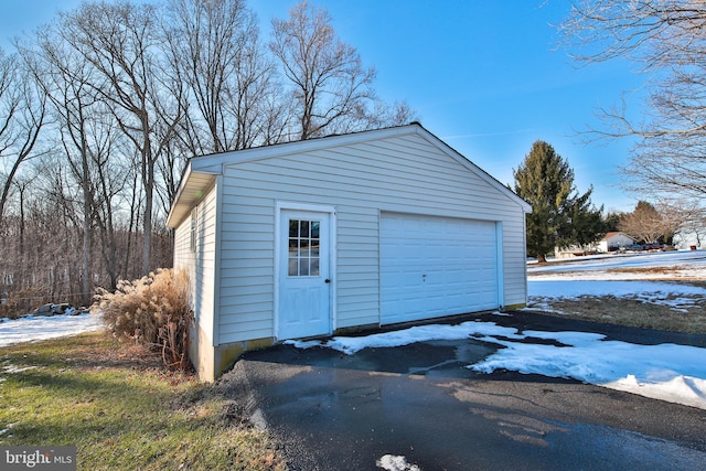 view of snow covered garage