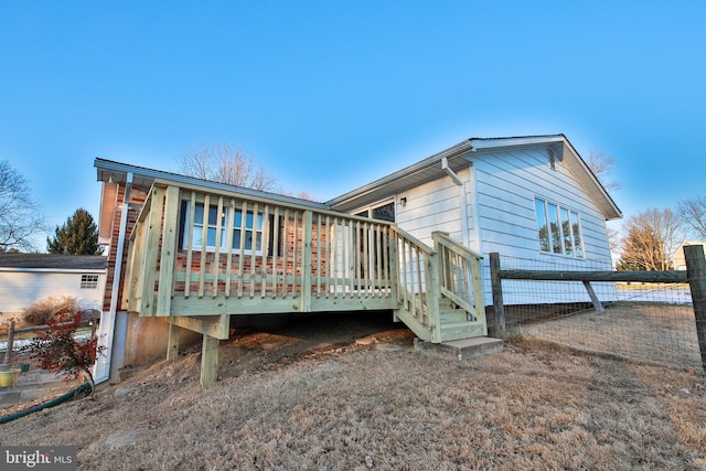 rear view of house with a deck