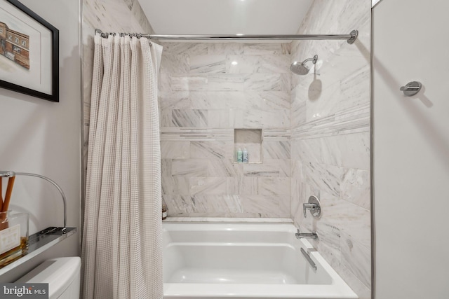 bathroom with shower / tub combo