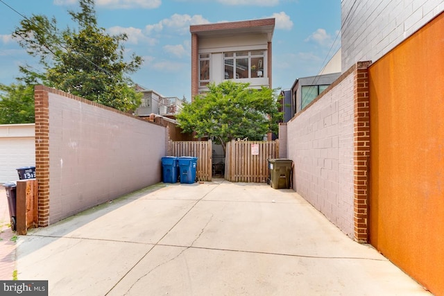 view of patio featuring fence